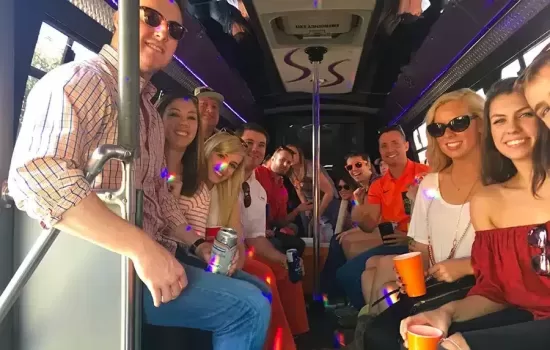 Guests celebrating on a Black Diamond party bus